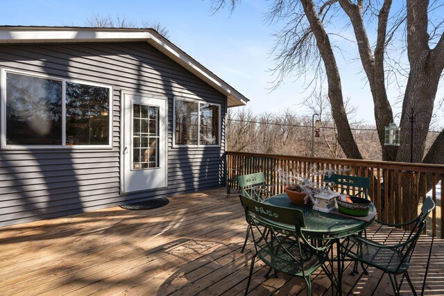 deck with outdoor dining space