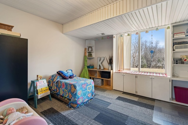 bedroom featuring visible vents