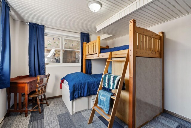 bedroom featuring baseboards