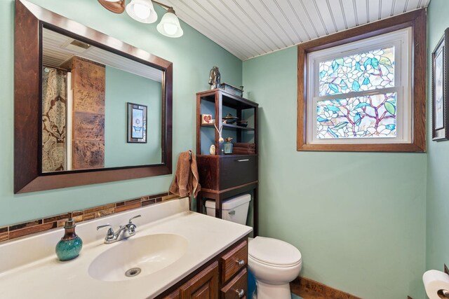 full bath with wood ceiling, toilet, and vanity