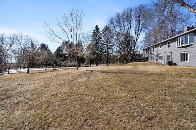 view of yard featuring central AC unit