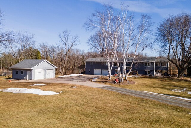 view of yard featuring a garage