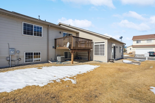 back of house featuring central AC unit