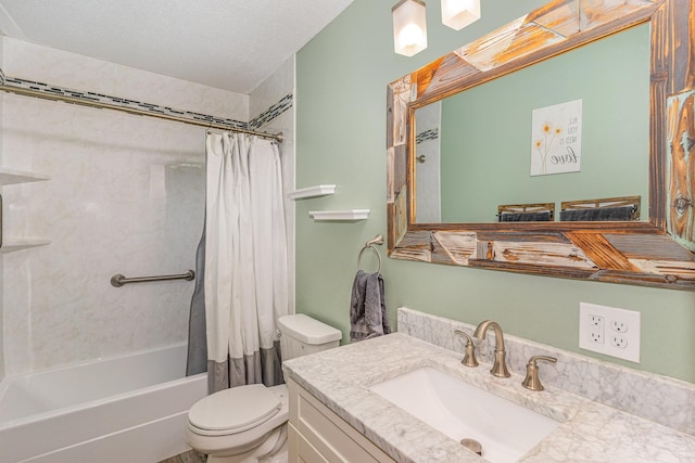 bathroom featuring toilet, shower / bath combo, vanity, and a textured ceiling