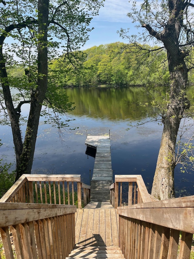 2897 Indian Mound Rd, Luck, WI 54853 - dock featuring a water view and a wooded view