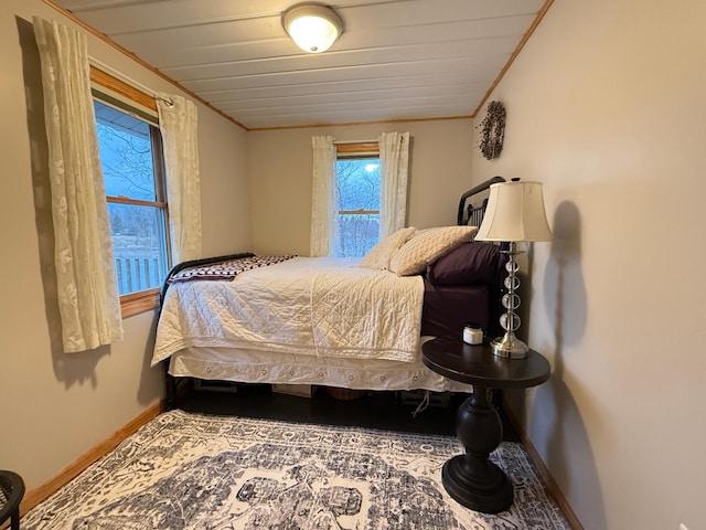 2897 Indian Mound Rd, Luck, WI 54853 - bedroom with baseboards and crown molding
