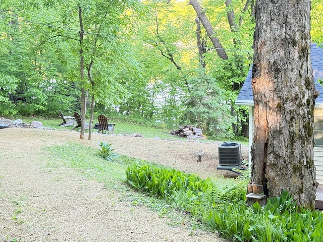 2897 Indian Mound Rd, Luck, WI 54853 - view of yard featuring central AC unit