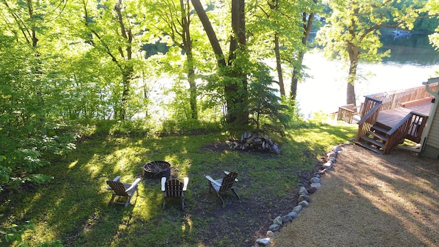 2897 Indian Mound Rd, Luck, WI 54853 - view of yard with a deck with water view and an outdoor fire pit