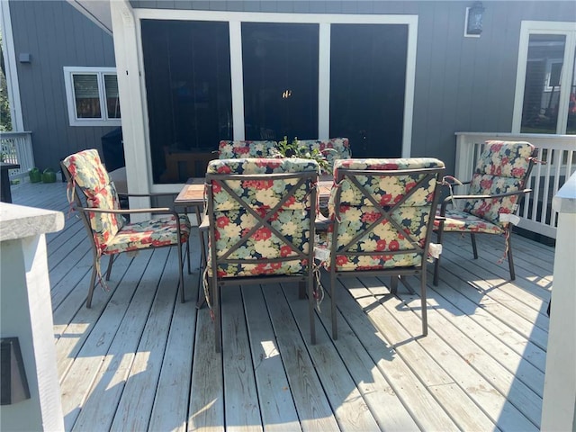 904 155th St, Burnsville, MN 55306 - wooden terrace with outdoor dining space