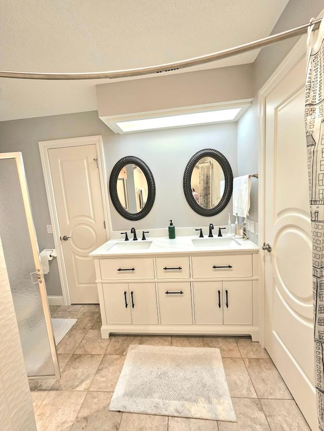 904 155th St, Burnsville, MN 55306 - full bathroom with double vanity and a shower with curtain