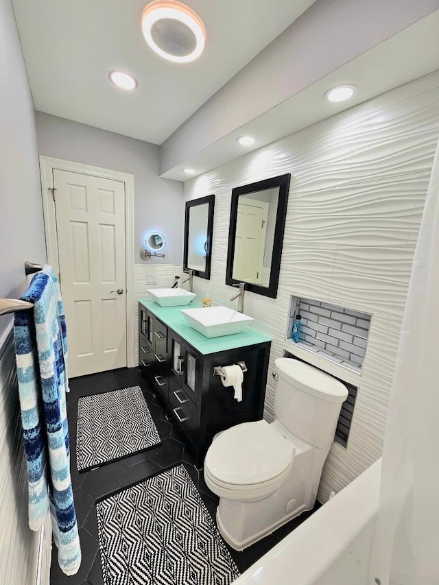 904 155th St, Burnsville, MN 55306 - full bath featuring toilet, recessed lighting, tile patterned floors, double vanity, and a bath