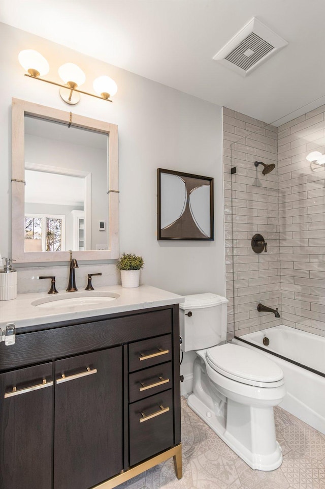 full bath featuring vanity, toilet, visible vents, and shower / bath combination