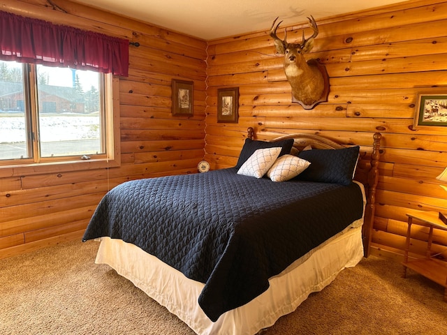 carpeted bedroom with rustic walls