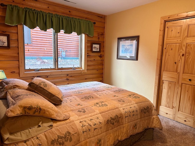 bedroom featuring visible vents and carpet floors