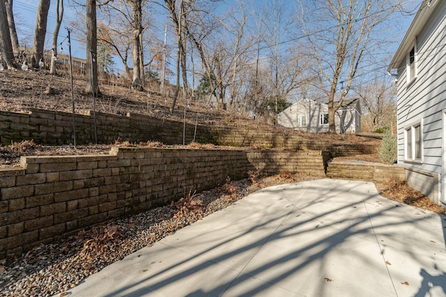 view of patio featuring fence