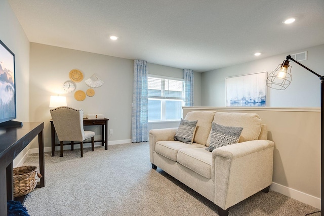 living area with visible vents, recessed lighting, baseboards, and carpet floors