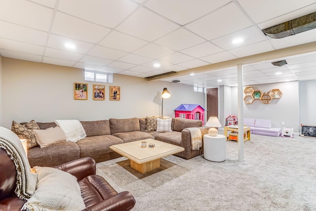 carpeted living room featuring recessed lighting and a paneled ceiling