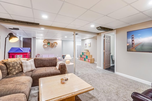 carpeted living room featuring recessed lighting and baseboards