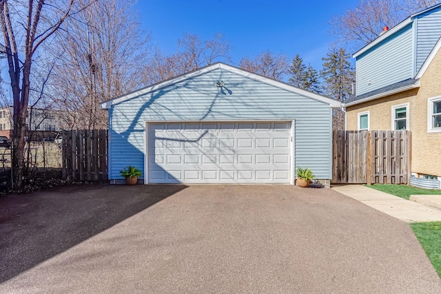 detached garage with fence