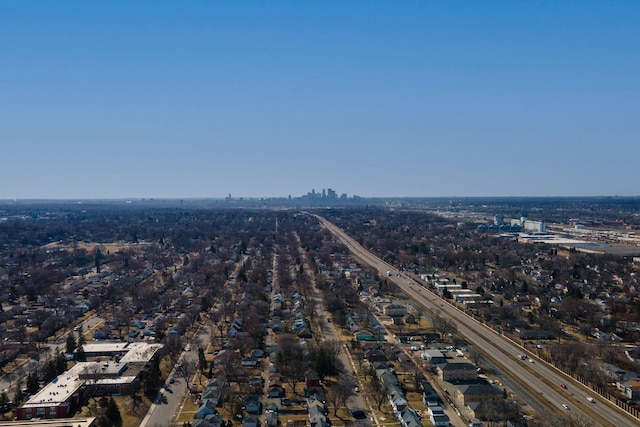 birds eye view of property with a view of city