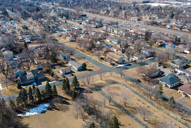 birds eye view of property with a residential view