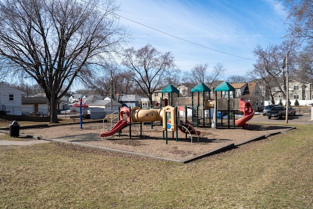 community play area with a lawn