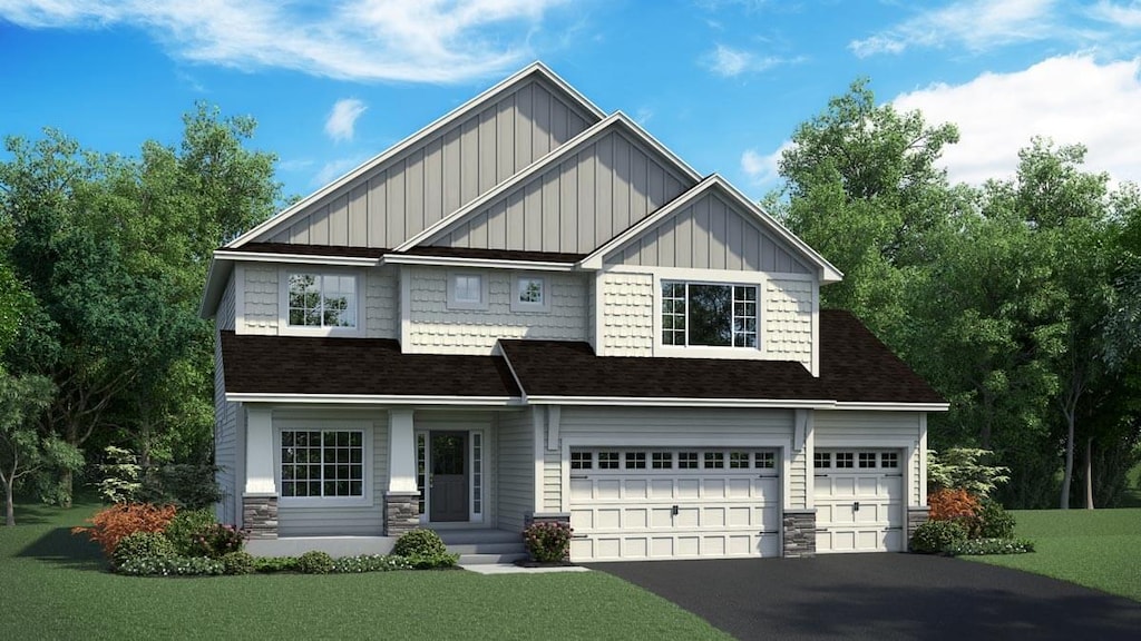 craftsman-style house with a front lawn, a garage, stone siding, aphalt driveway, and board and batten siding