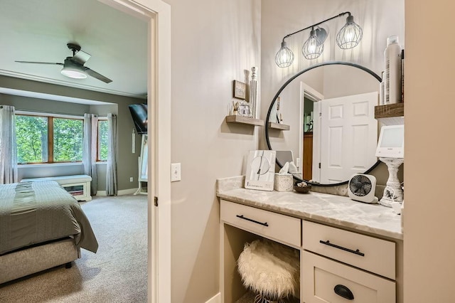 bathroom featuring baseboards, vanity, and ceiling fan