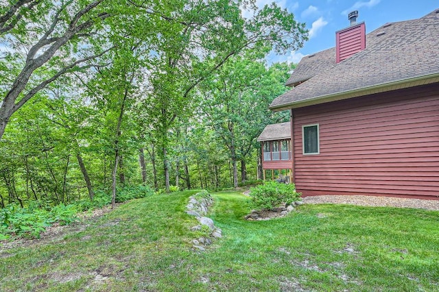 view of yard with a sunroom