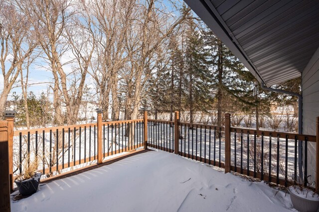 view of snow covered deck