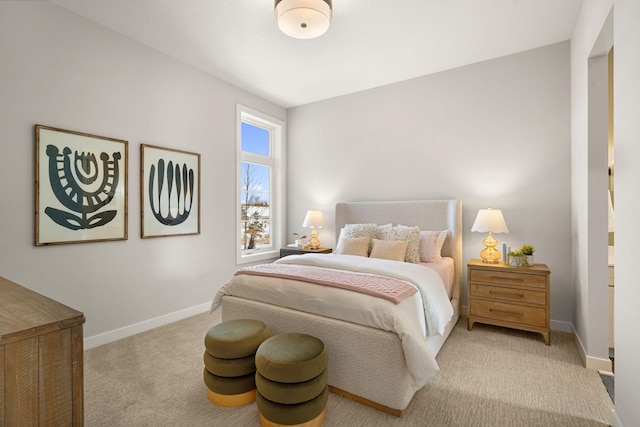 carpeted bedroom with baseboards