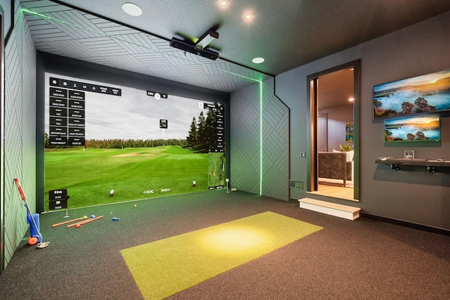 playroom with carpet floors, baseboards, and golf simulator