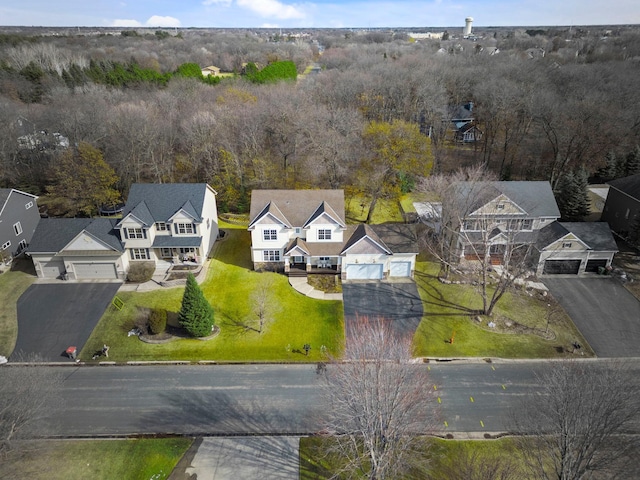 birds eye view of property with a residential view