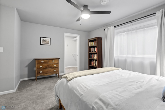 bedroom featuring baseboards, carpet floors, and ceiling fan