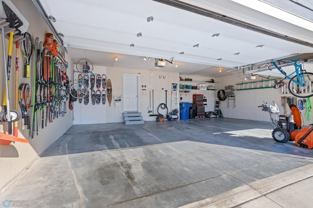 garage featuring a garage door opener