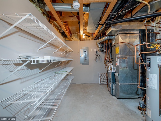 utility room featuring heating unit, electric panel, and water heater