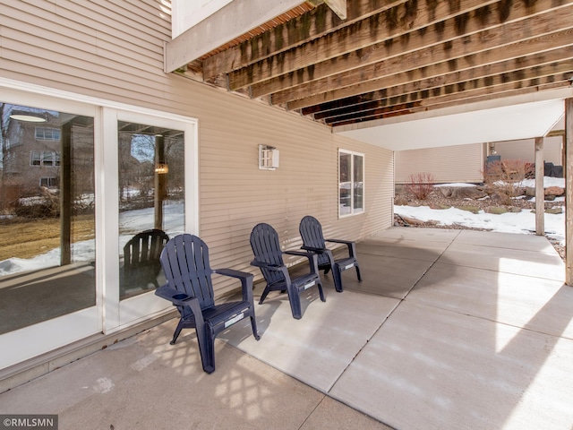 view of snow covered patio