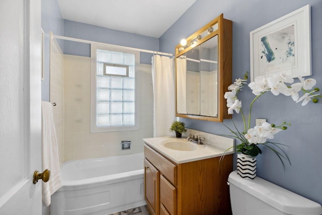 bathroom featuring shower / bathtub combination with curtain, toilet, and vanity