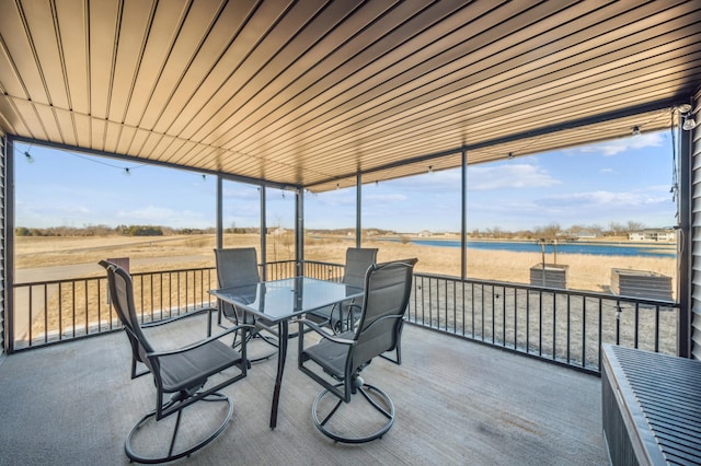 35647 Oxford Ave, Chisago Lake Twp, MN 55012 - sunroom / solarium with outdoor dining space and a water view