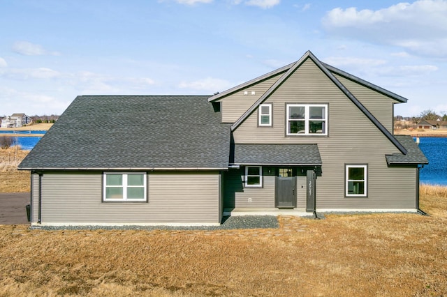 35647 Oxford Ave, Chisago Lake Twp, MN 55012 - rear view of house featuring roof with shingles and a water view