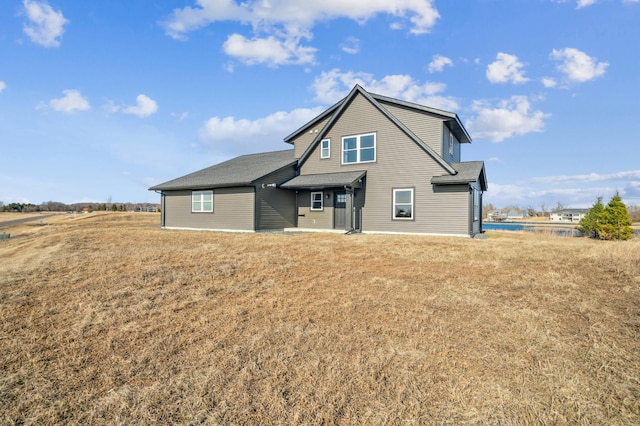 35647 Oxford Ave, Chisago Lake Twp, MN 55012 - rear view of property with a lawn and a shingled roof