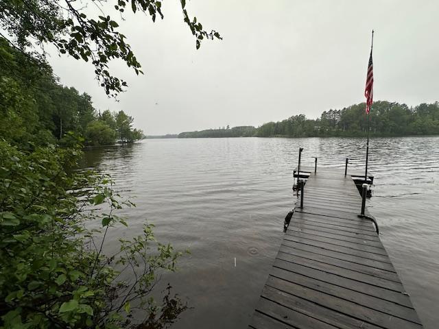 view of dock with a water view