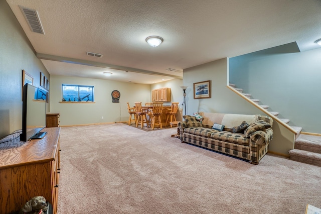 carpeted living room with visible vents, a bar, and stairs