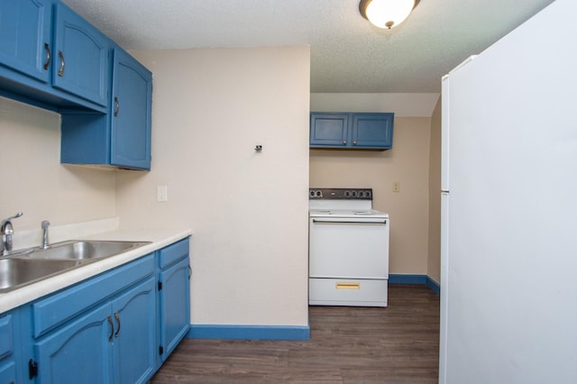 kitchen with blue cabinetry, white electric range oven, and a sink