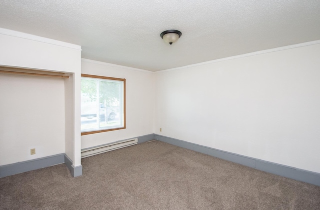 unfurnished bedroom with baseboards, baseboard heating, a textured ceiling, and carpet