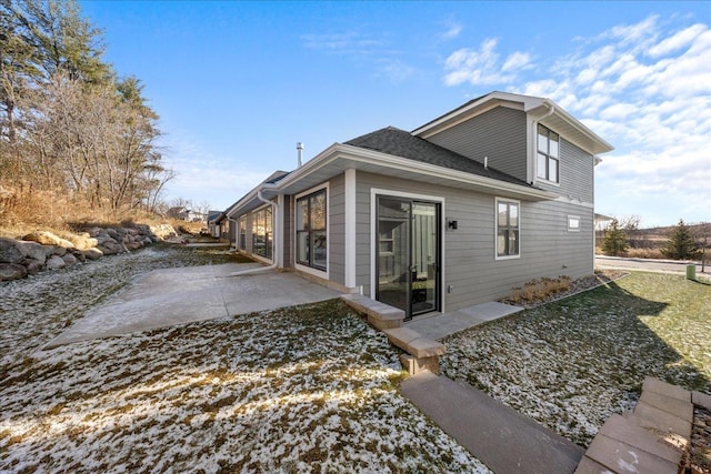 rear view of house featuring a patio area