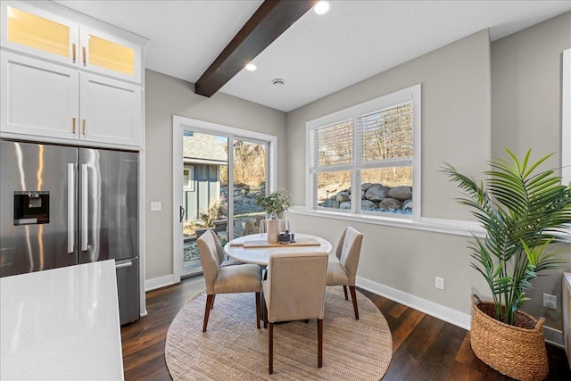 dining room with recessed lighting, beamed ceiling, baseboards, and dark wood-type flooring