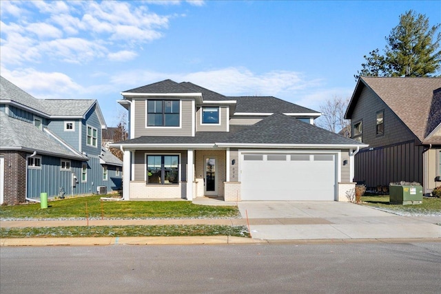696 Inspiration Pl, Bayport, MN 55003 - traditional home with an attached garage, driveway, a front lawn, and brick siding