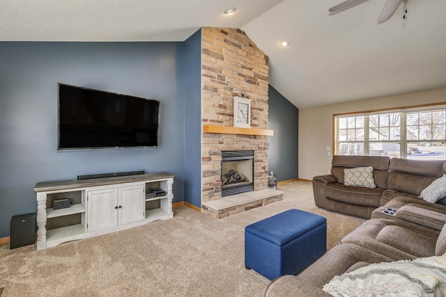 living room featuring baseboards, carpet floors, ceiling fan, and a fireplace