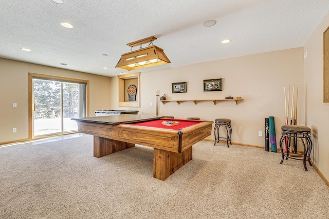 recreation room with carpet flooring, recessed lighting, a textured ceiling, and baseboards